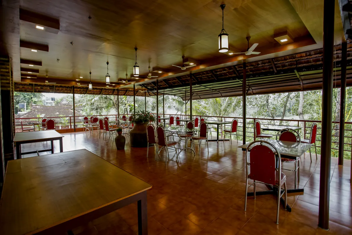 Dining hall overlooking the trees at Athreya Ayurvedic Centre