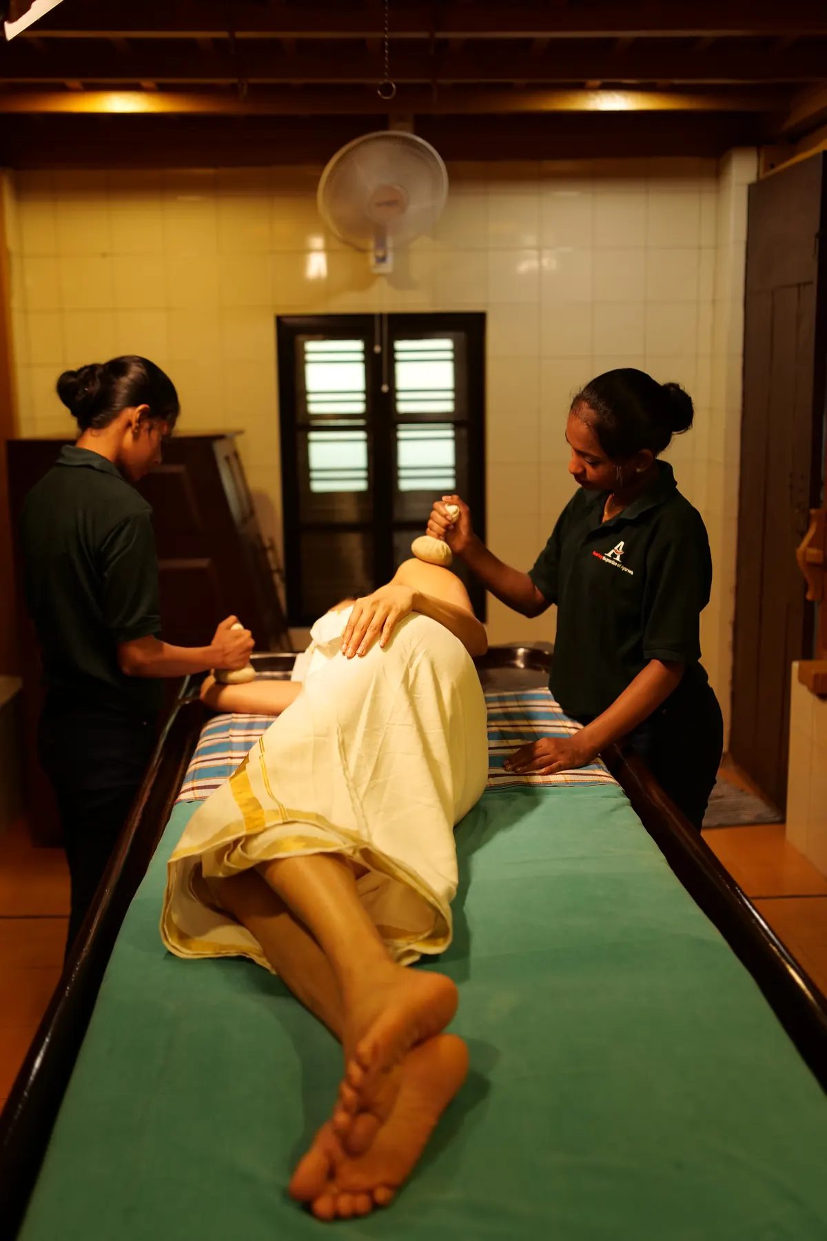 Kizhi with two therapists at Athreya Ayurvedic Centre