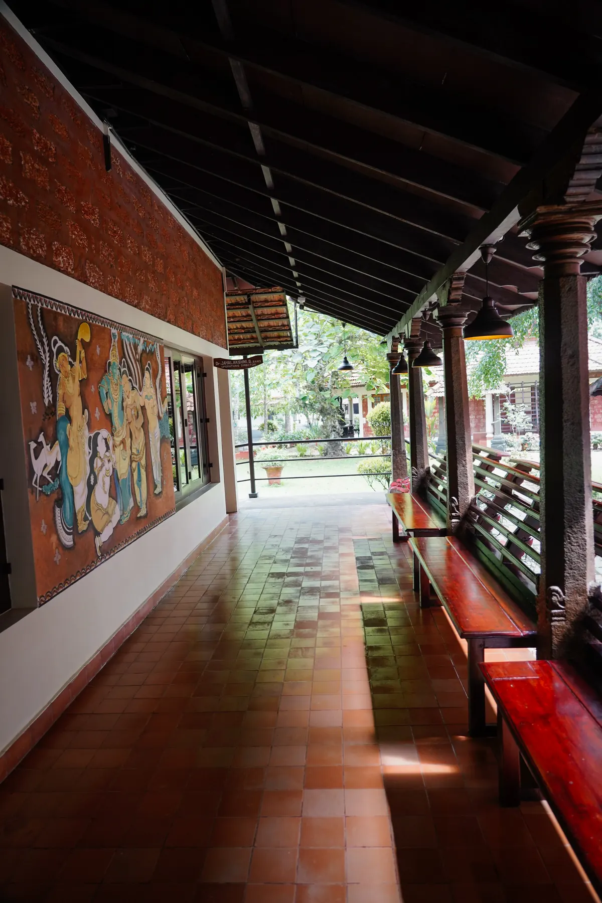 Verandah with a Kerala mural at Athreya Ayurvedic Centre