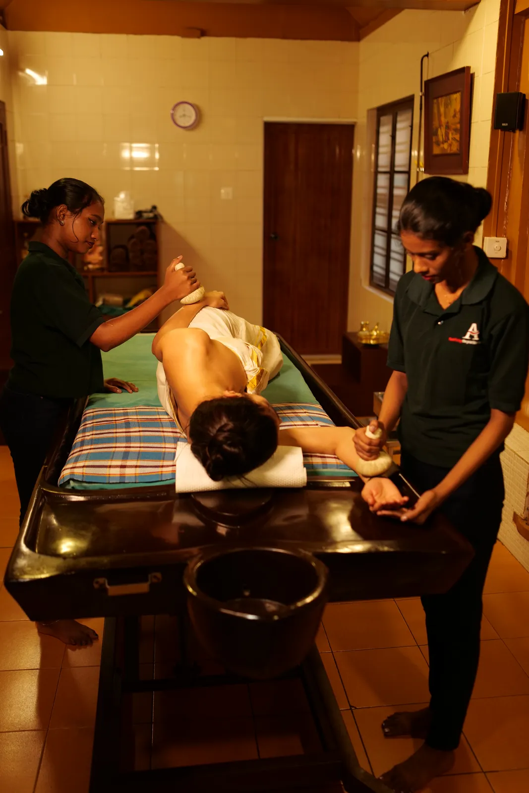 Kizhi therapy during a Panchakarma programme at Athreya