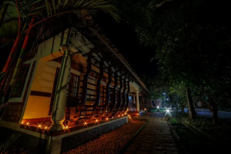 Oil lamps lighting the cottages at Athreya in the evening, for Pitta (fire and water)